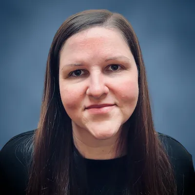 Angela Davidson, Case and Office Manager at Brant Hickey Orlando, smiling at the camera